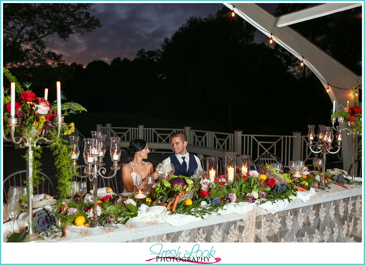 farm table wedding couple toast