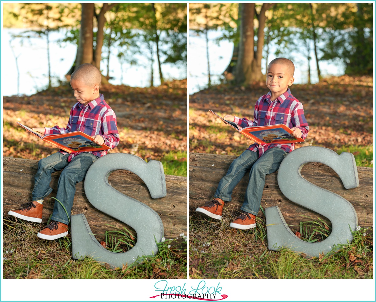 handsome little boy reading