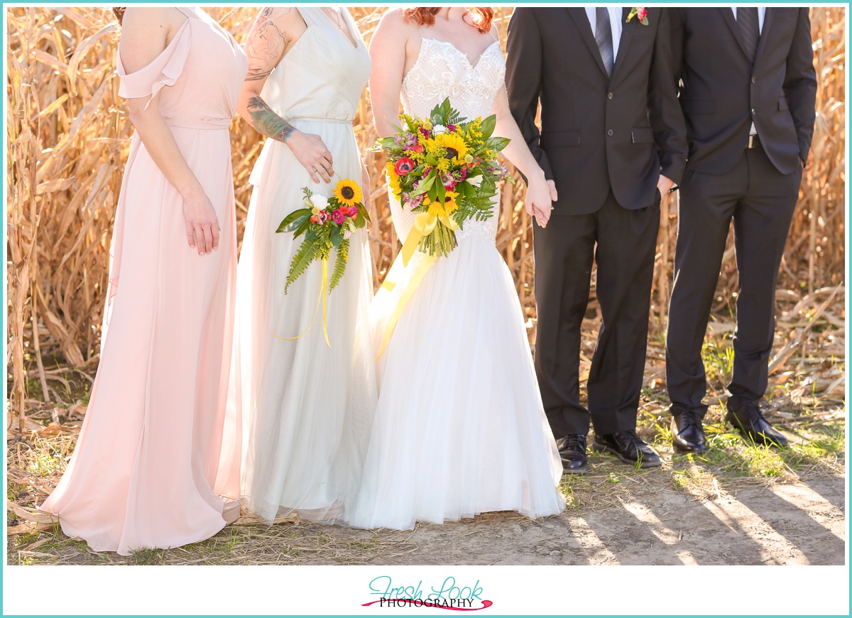 Farm wedding party posing