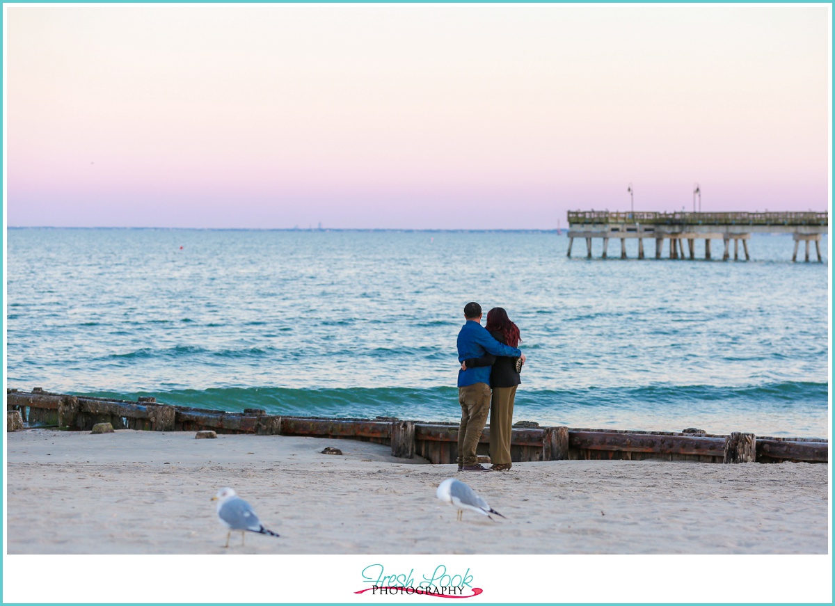 couple on the beach at sunset