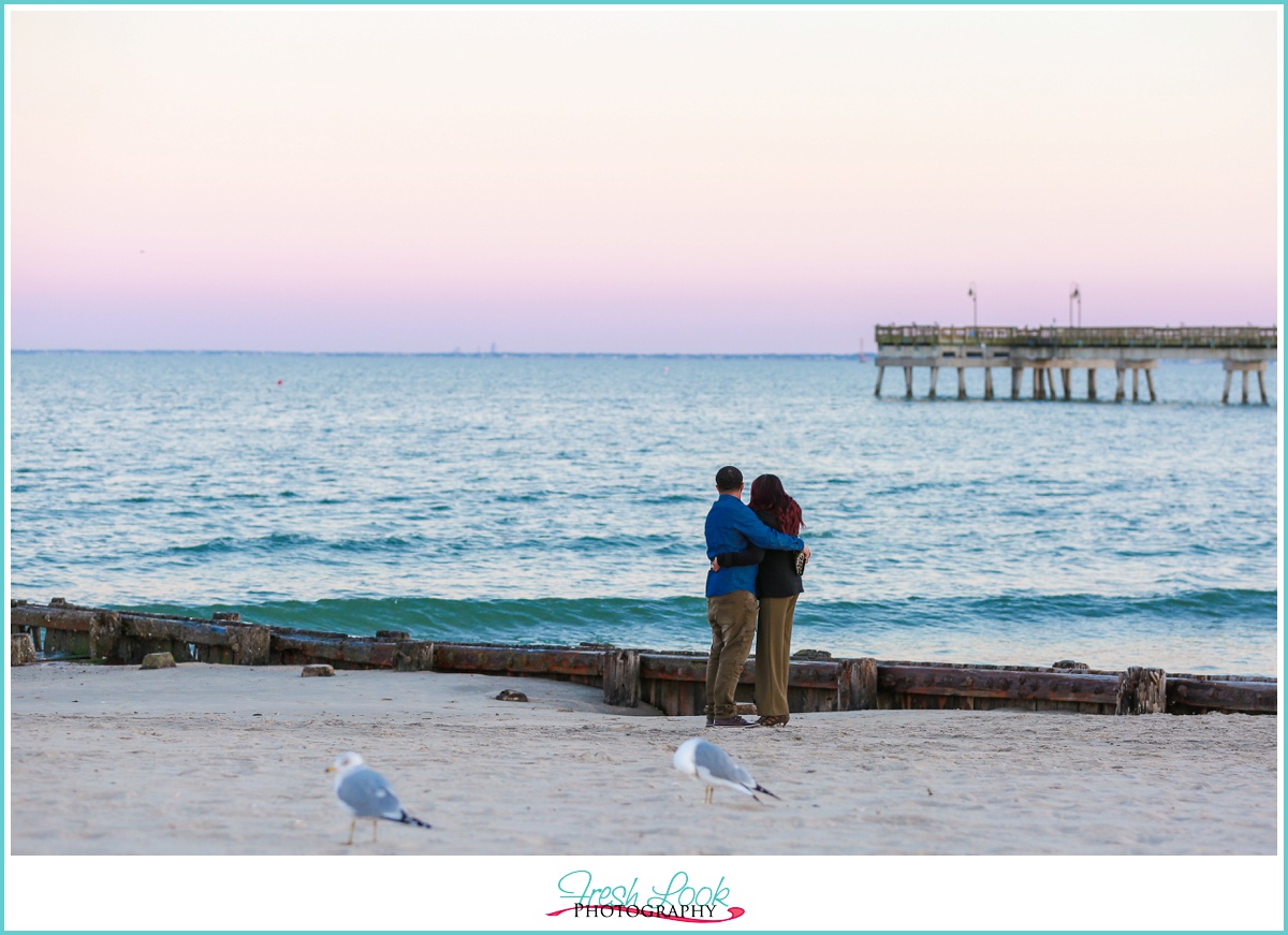 couple on the beach at sunset