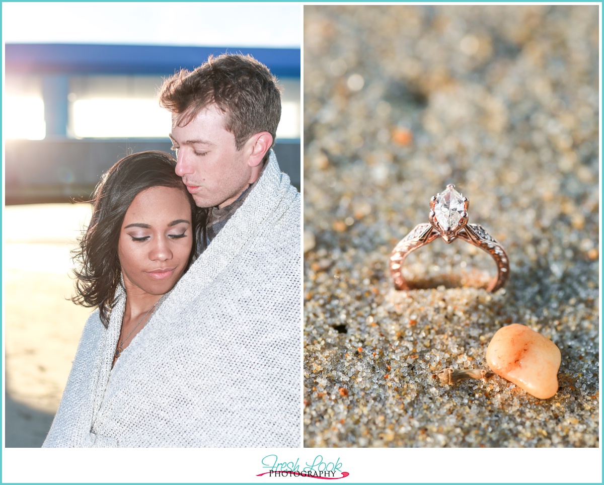 snuggling together beach engagement ring