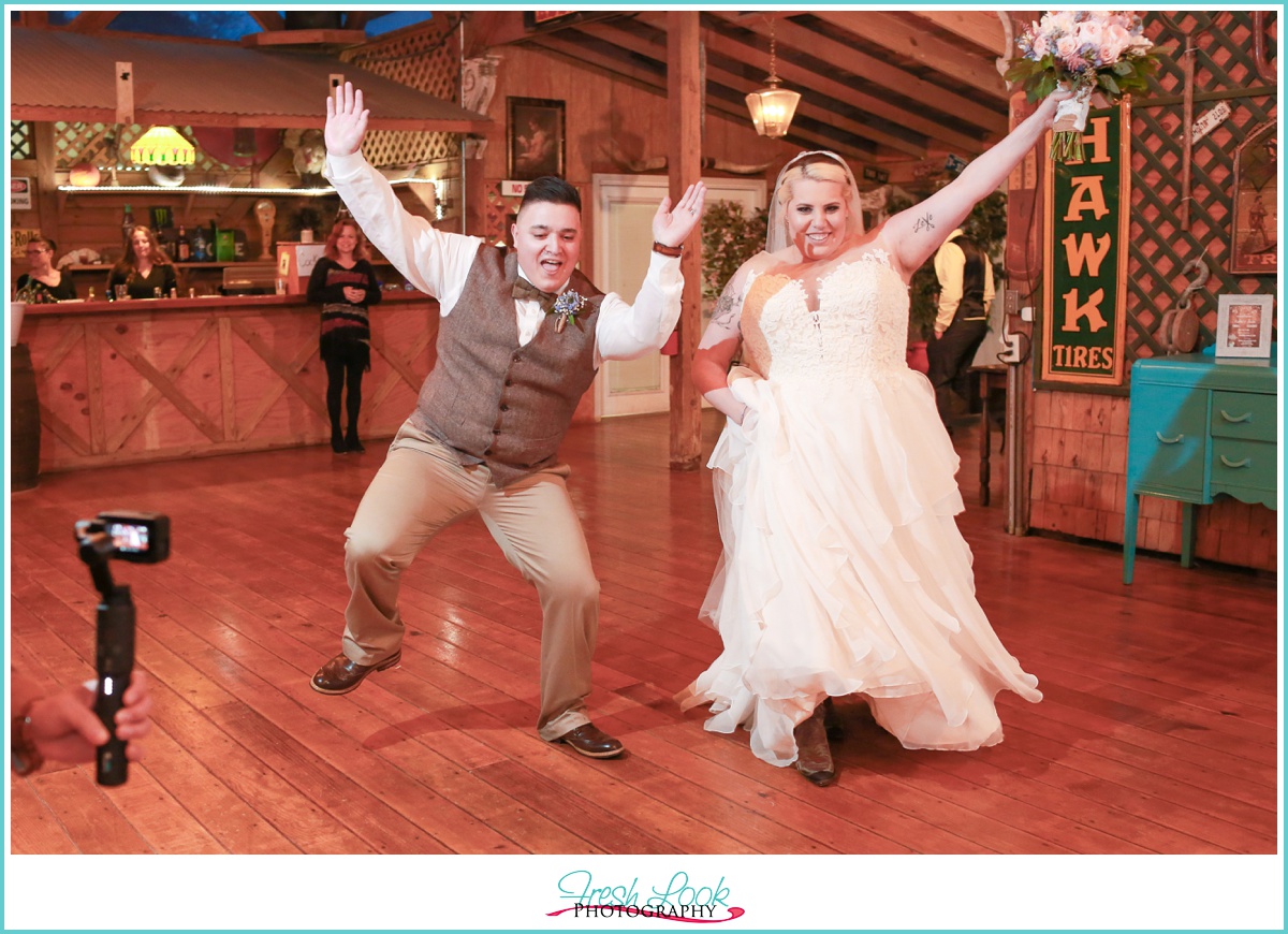 Bride and Groom entering reception