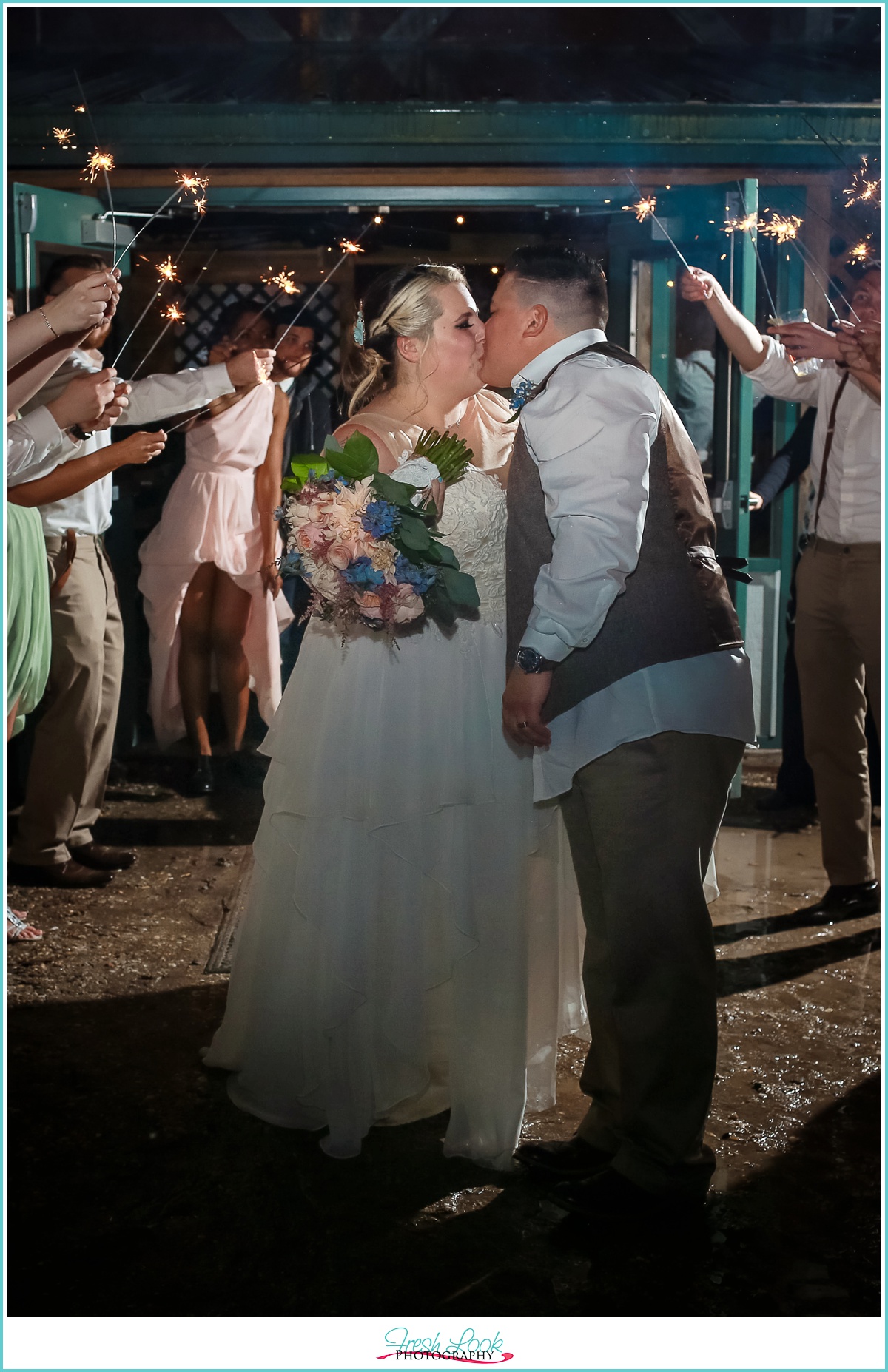 rainy sparkler wedding exit