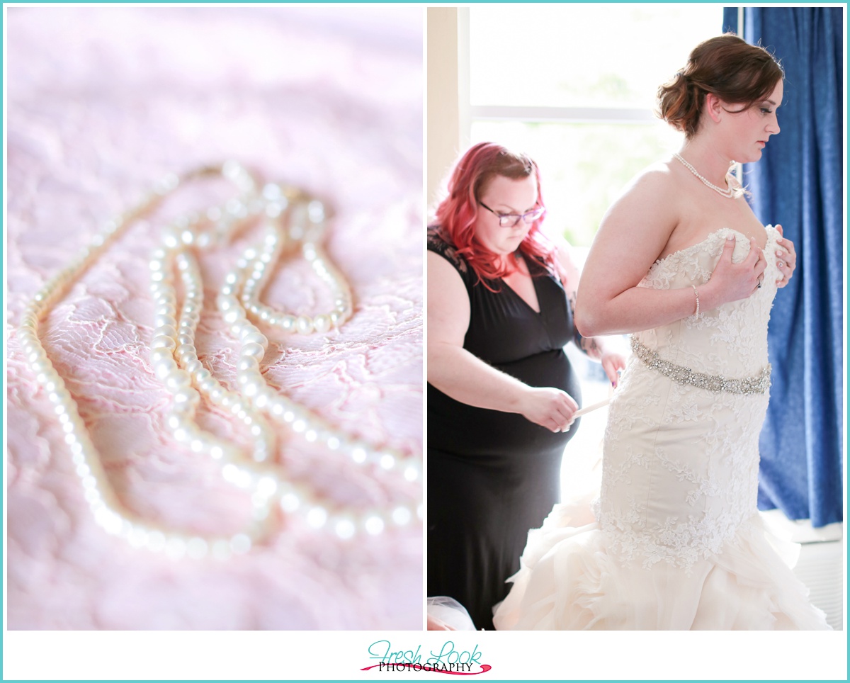 lacing up the wedding gown