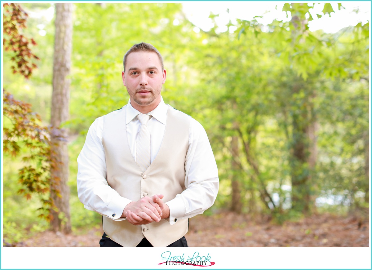 groom in yellow vest and tie