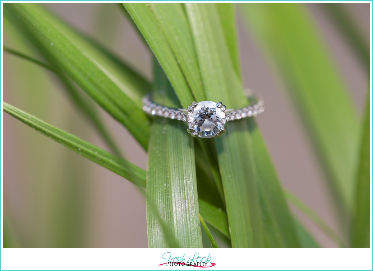 round engagement ring in seagrass