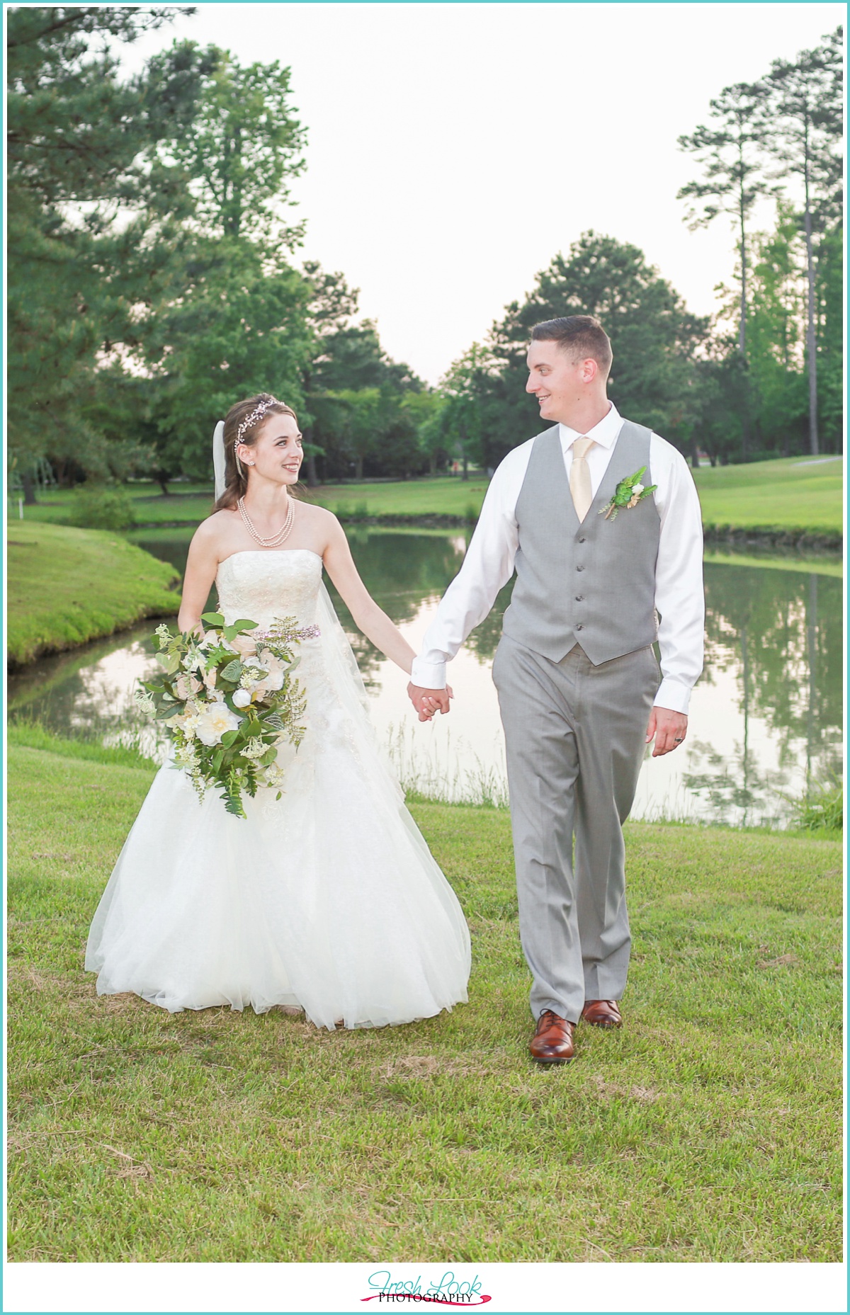 bride and groom walking hand in hand