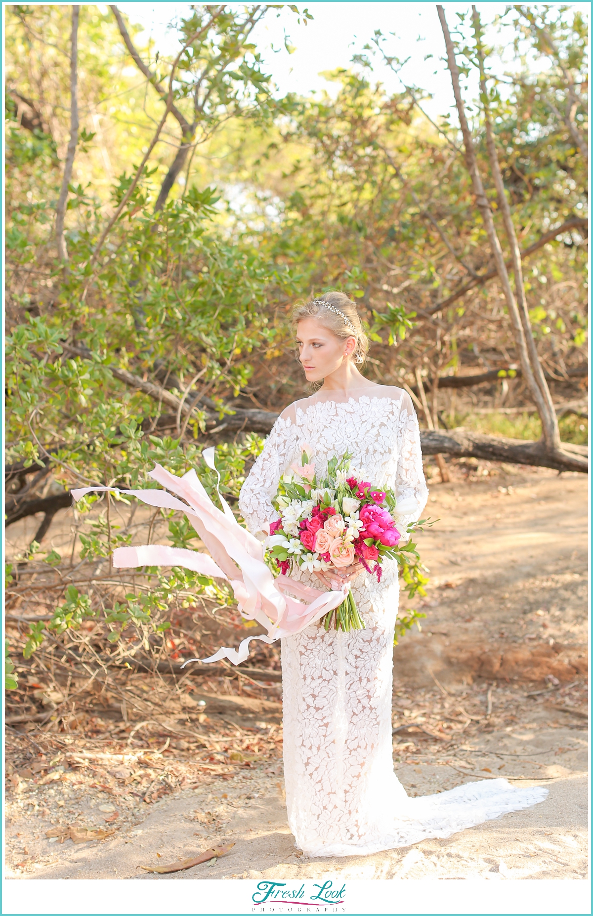 bride with elegant ribbon bouquet