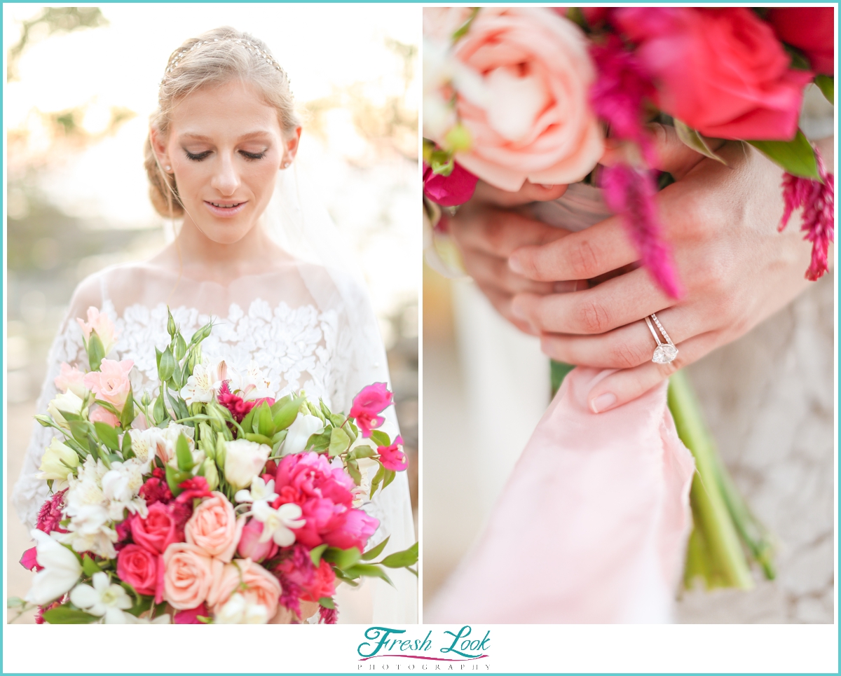 bride holding pink tropical wedding bouquet