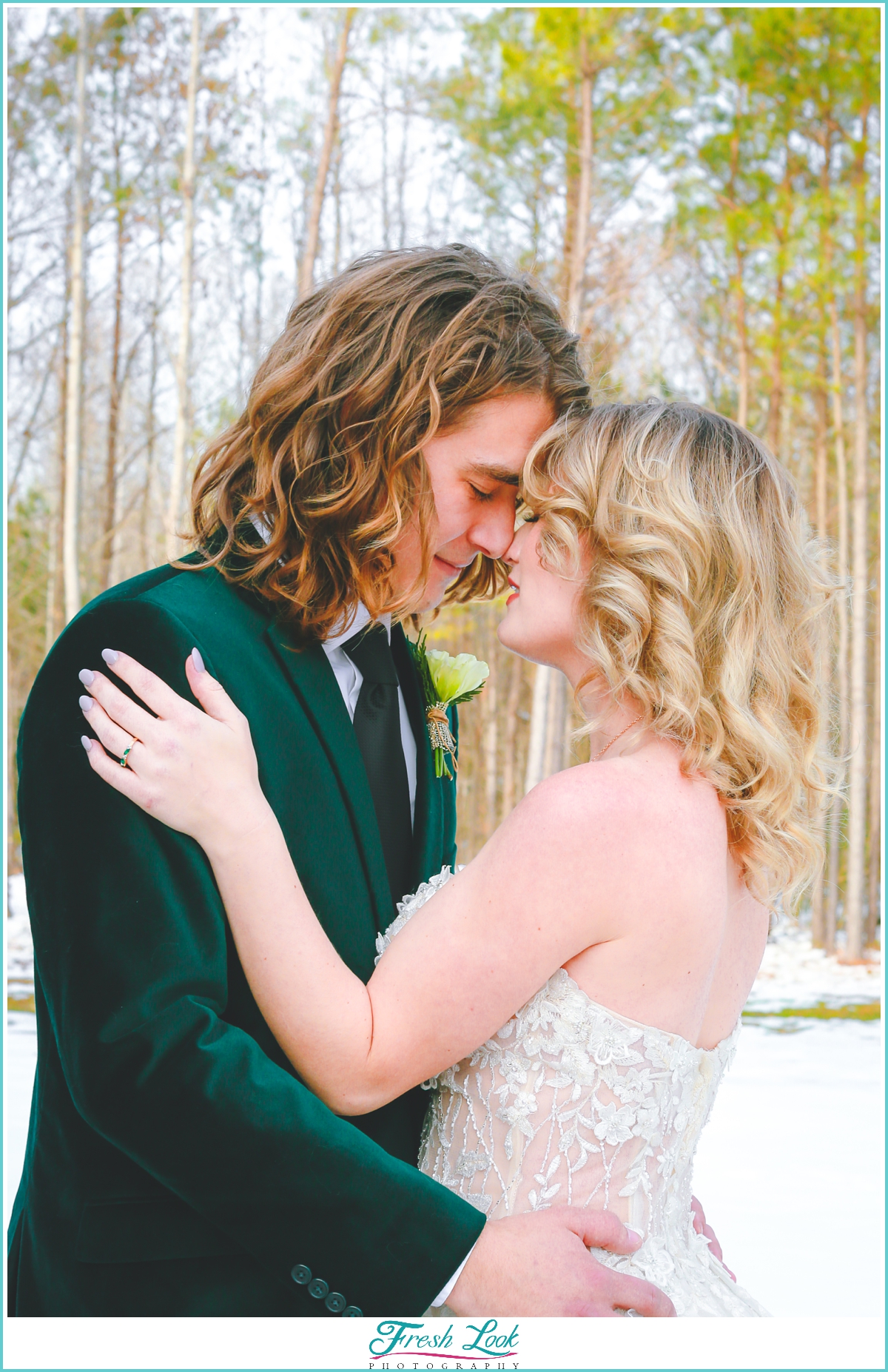 bride and groom snow portraits