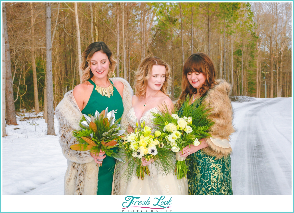 bride and bridesmaids snow portraits