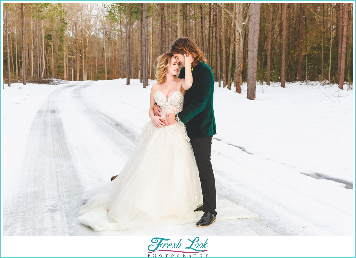 bride and groom snow wedding portraits