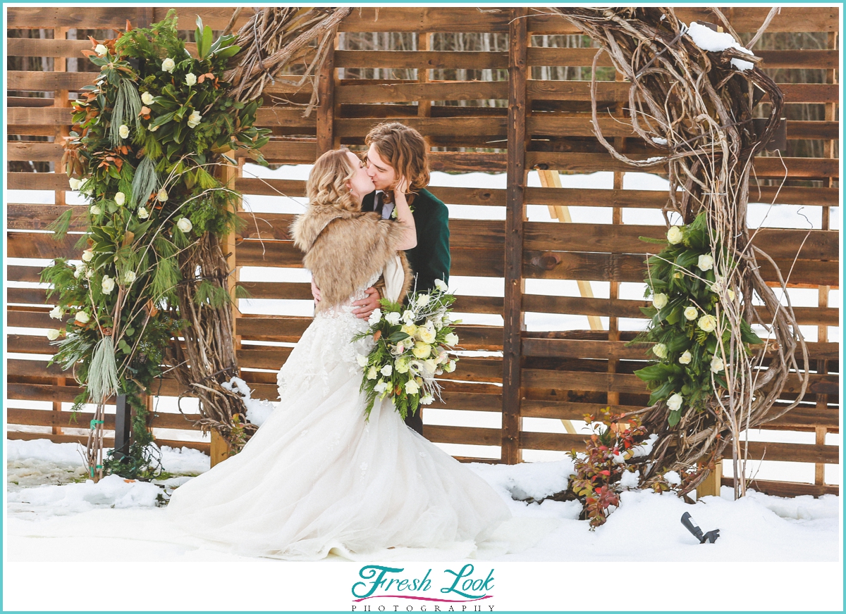 Fun bride and groom photos in the snow