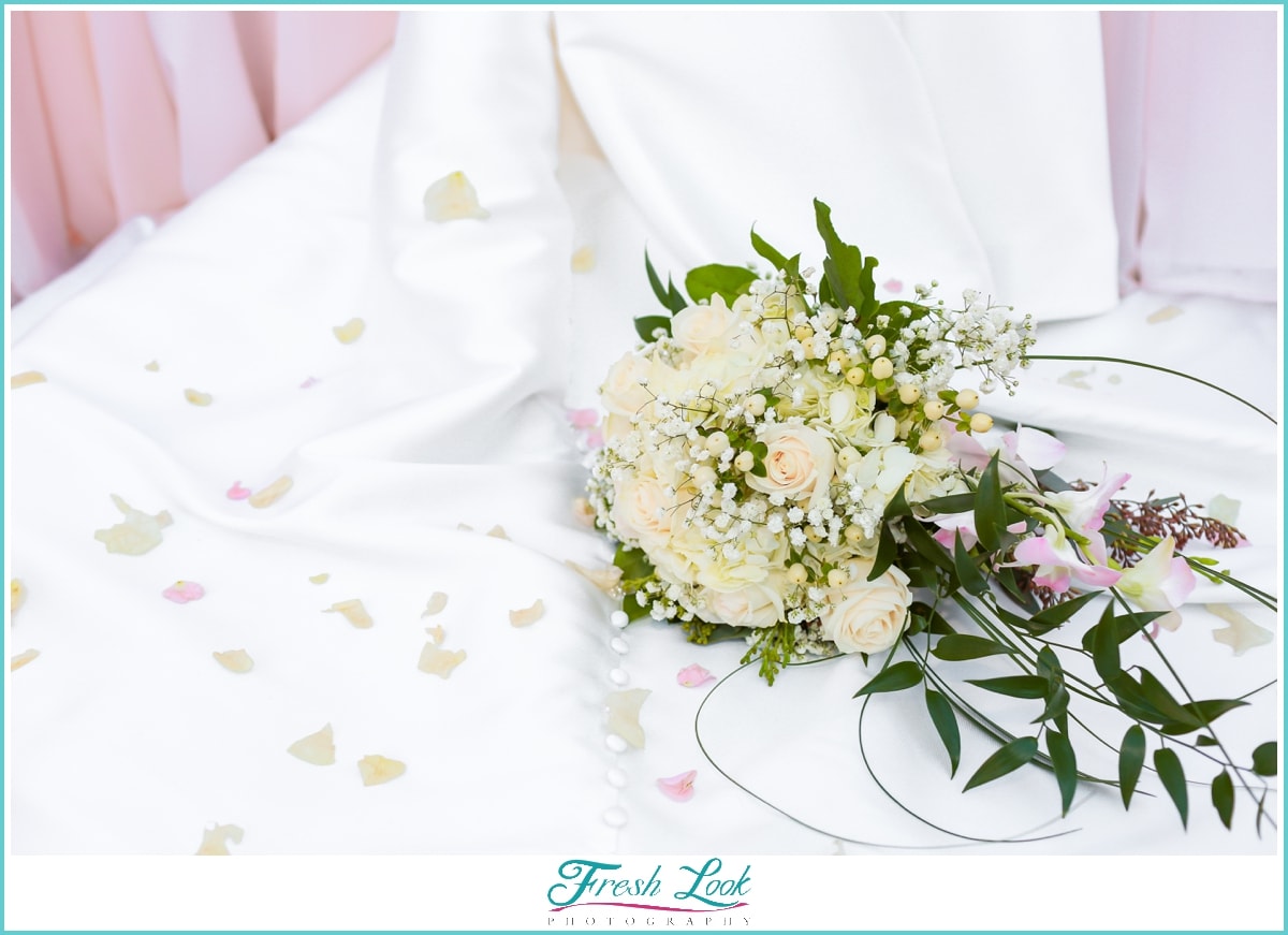 flower petals on brides dress