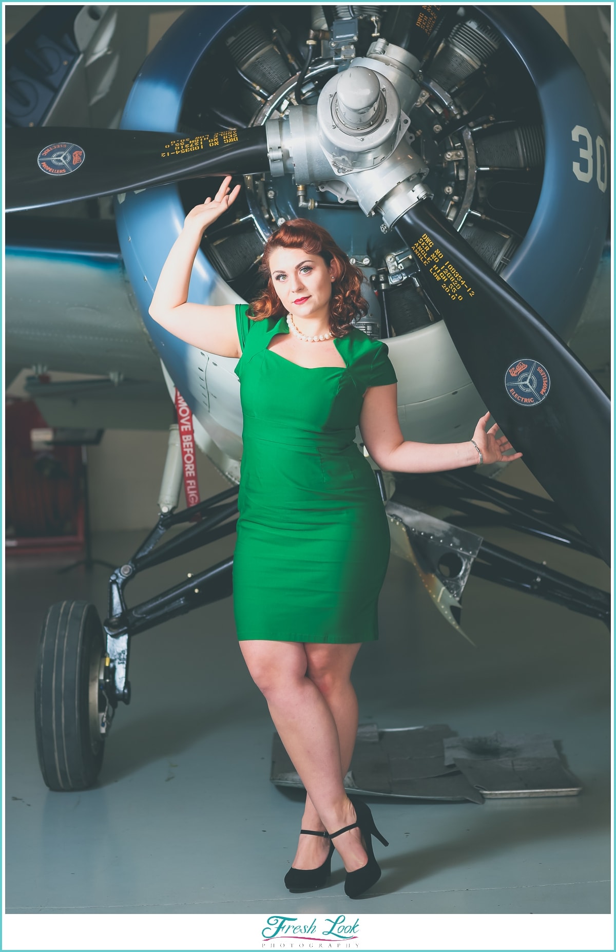 pin up model with vintage plane