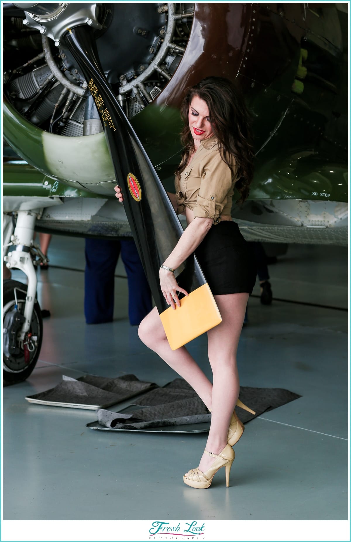sultry pin up girl with airplane