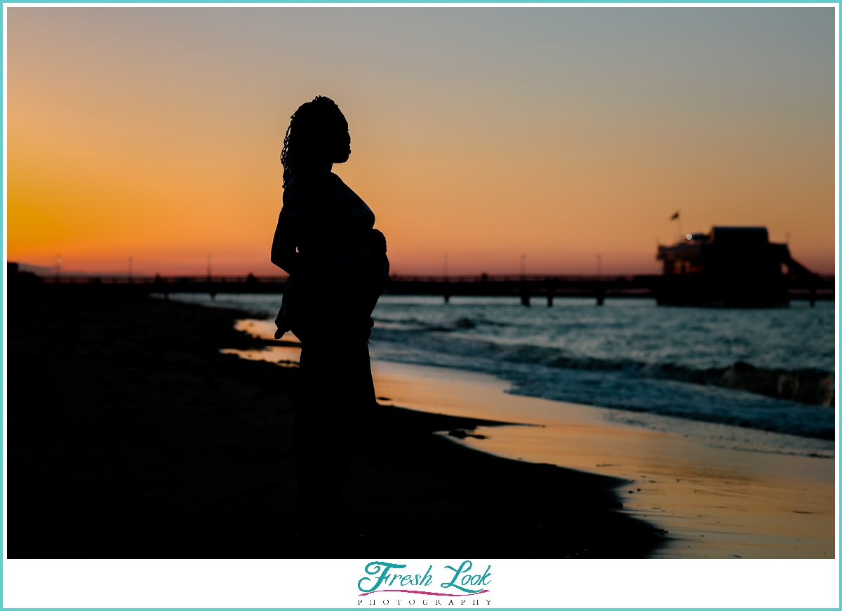 maternity silhouette on the beach