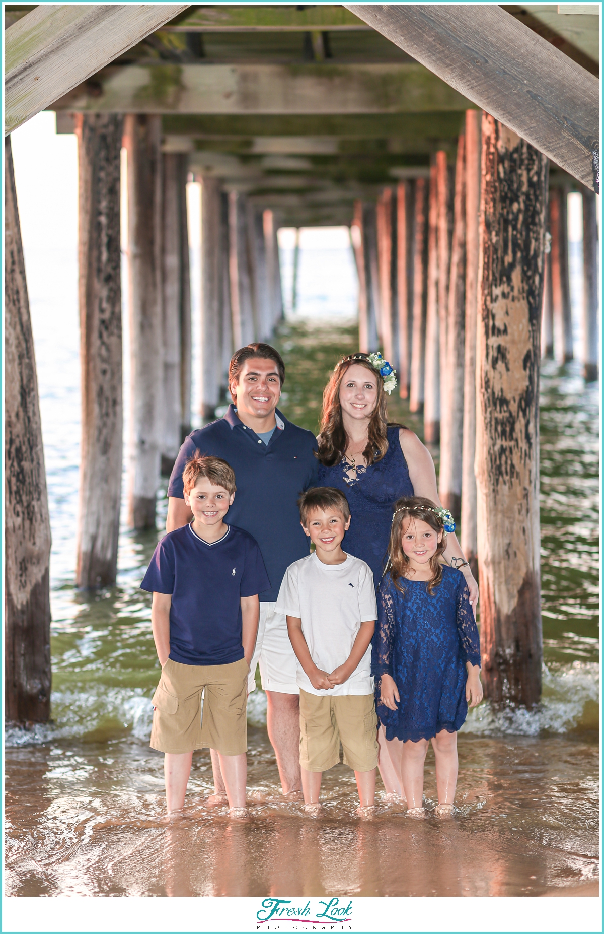 family photos under the pier