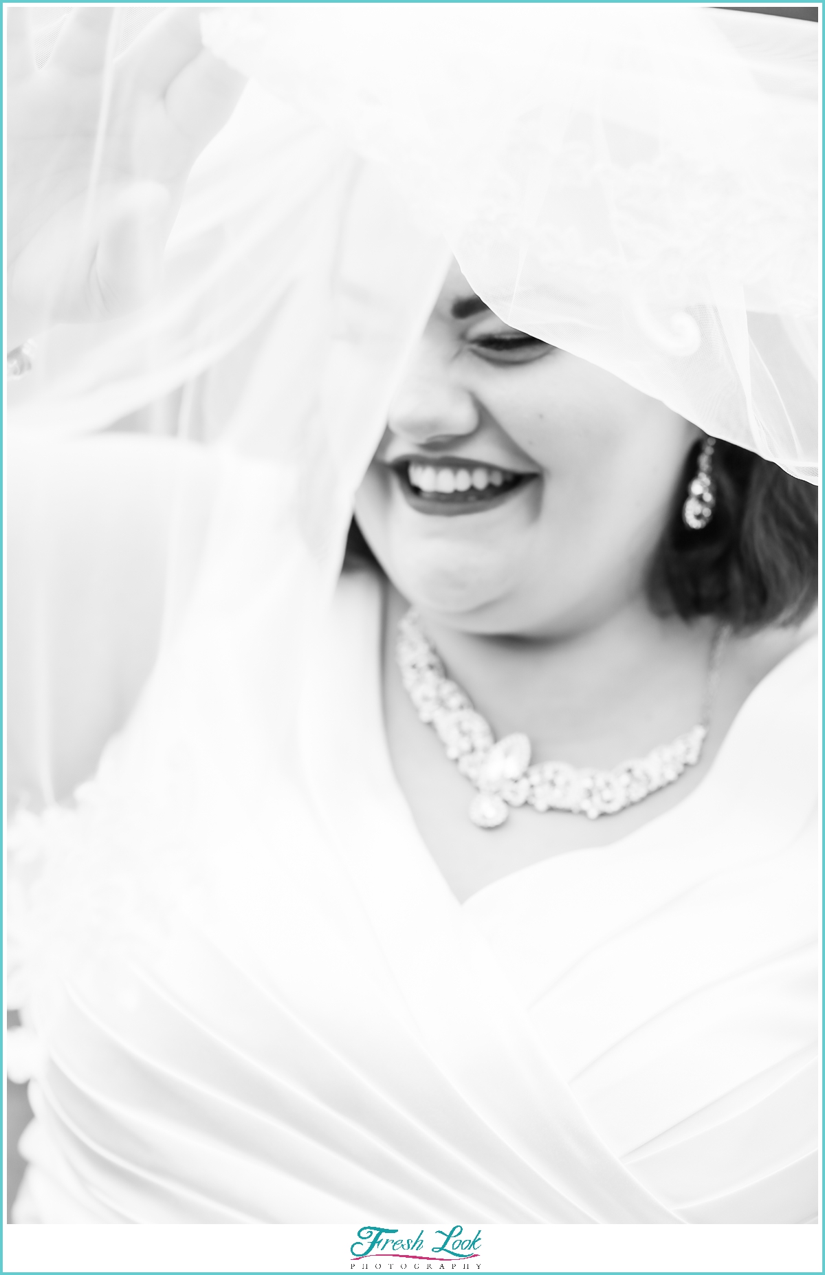 laughing bride in black and white