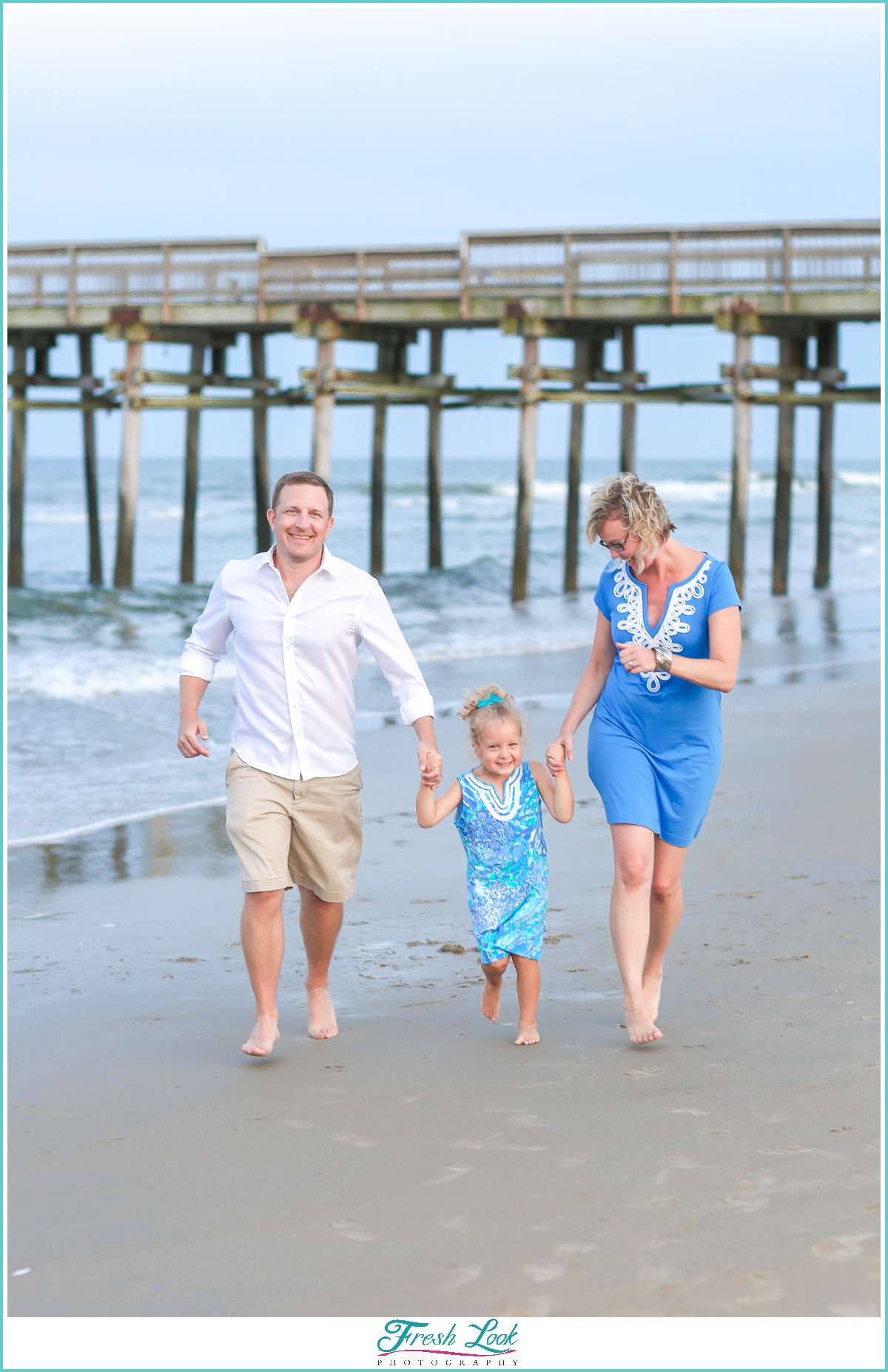 family running and having fun during photoshoot