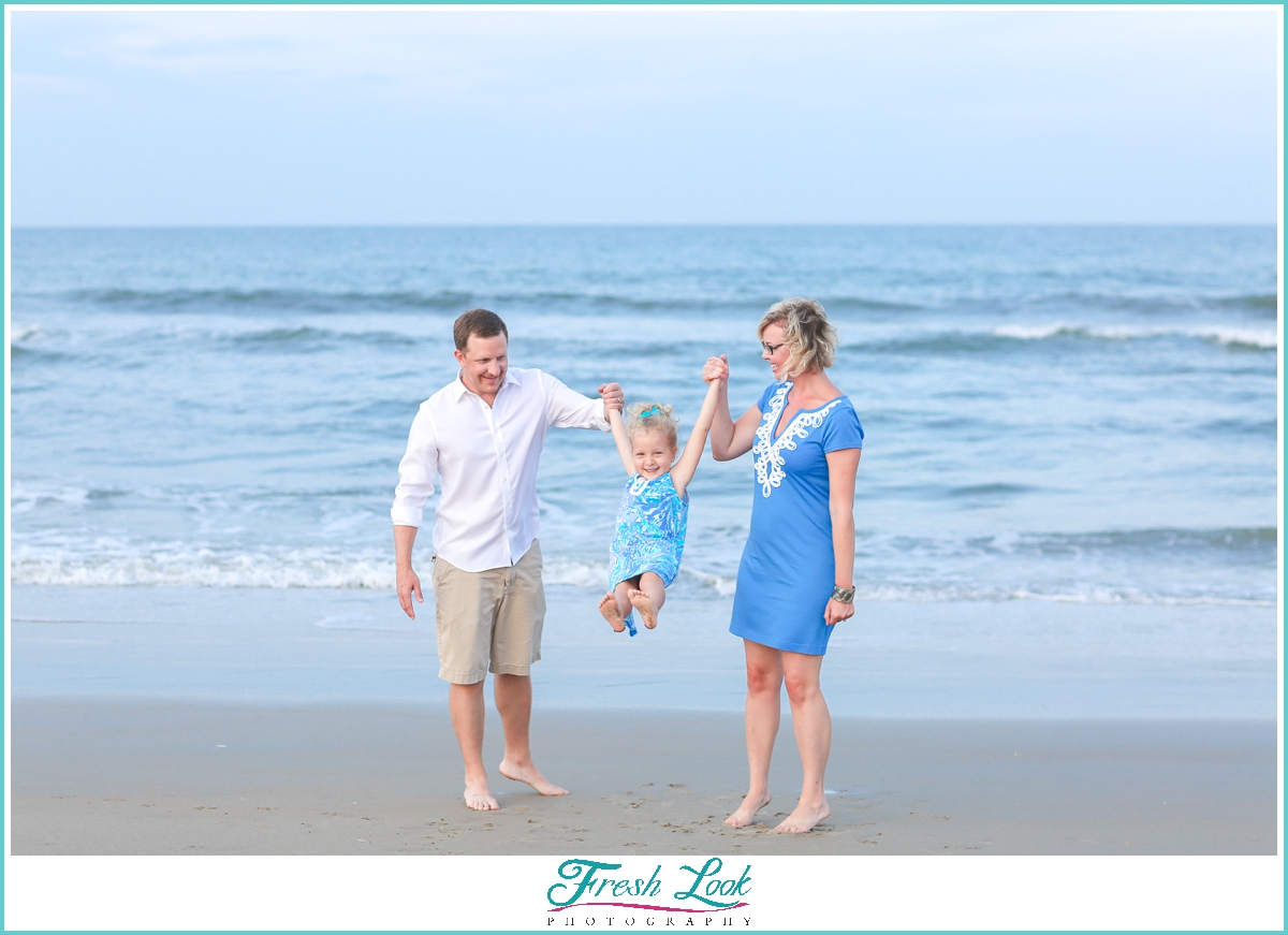 fun beach family photos in Sandbridge