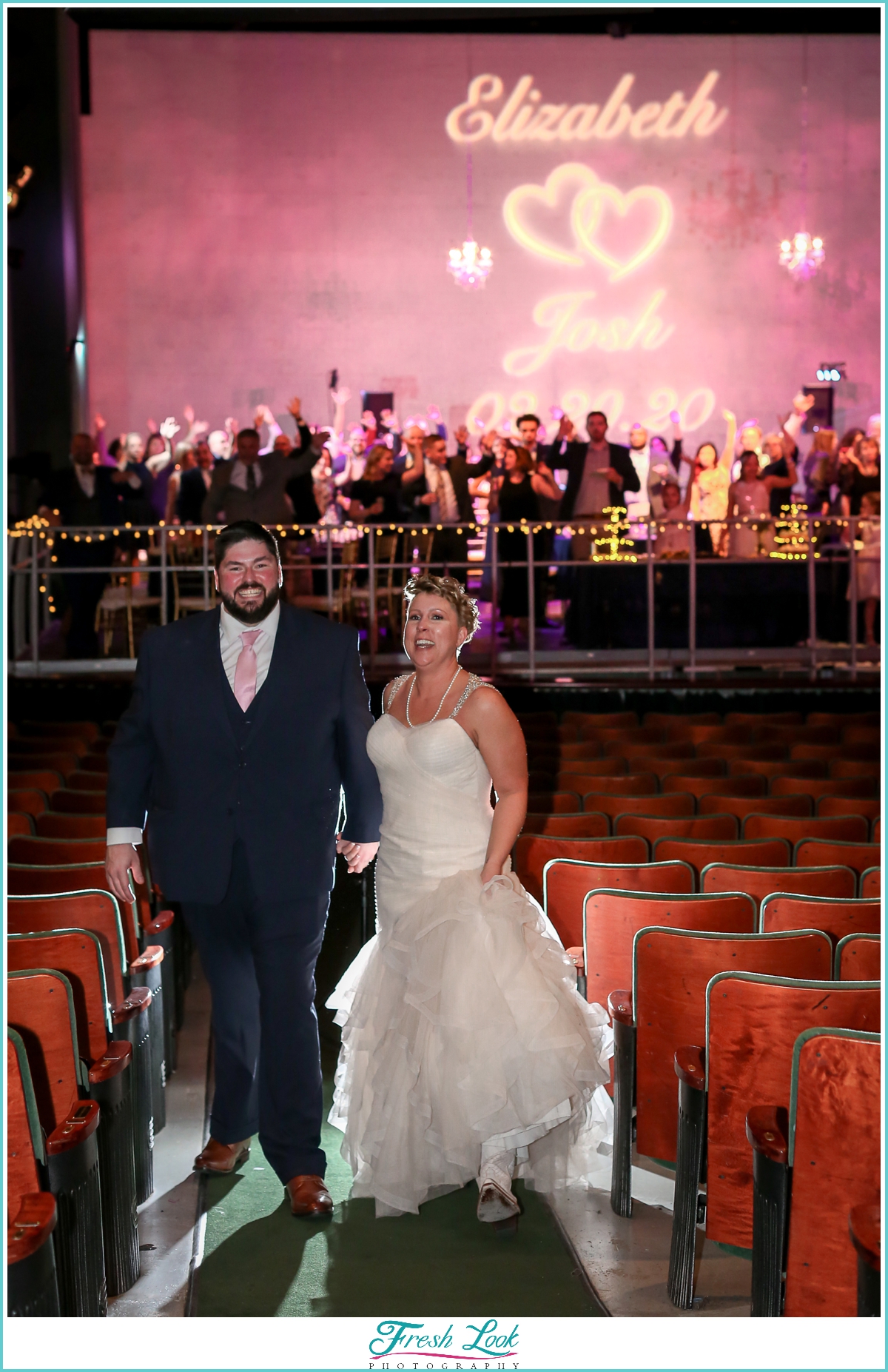 bride and groom leaving reception