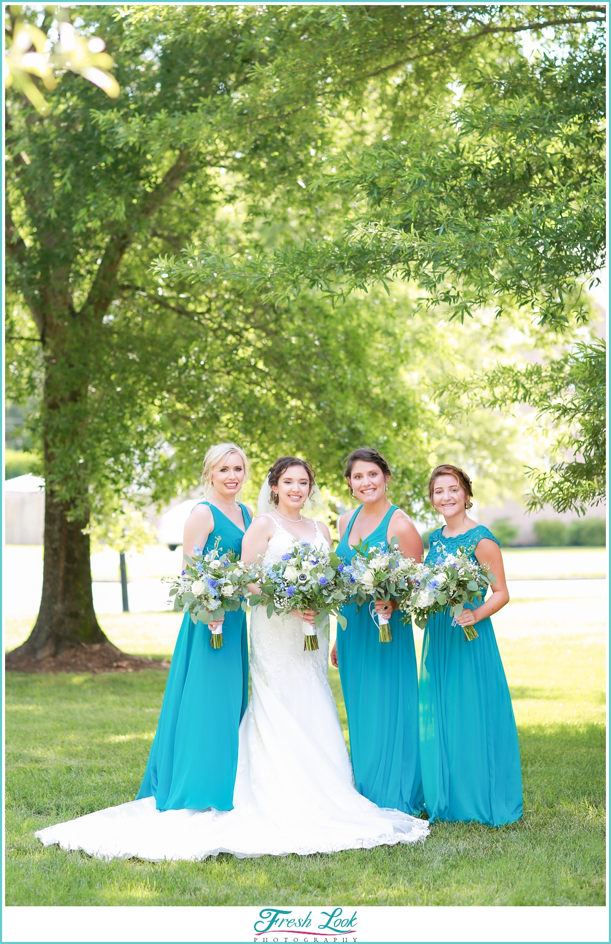 bride and bridesmaids wearing teal