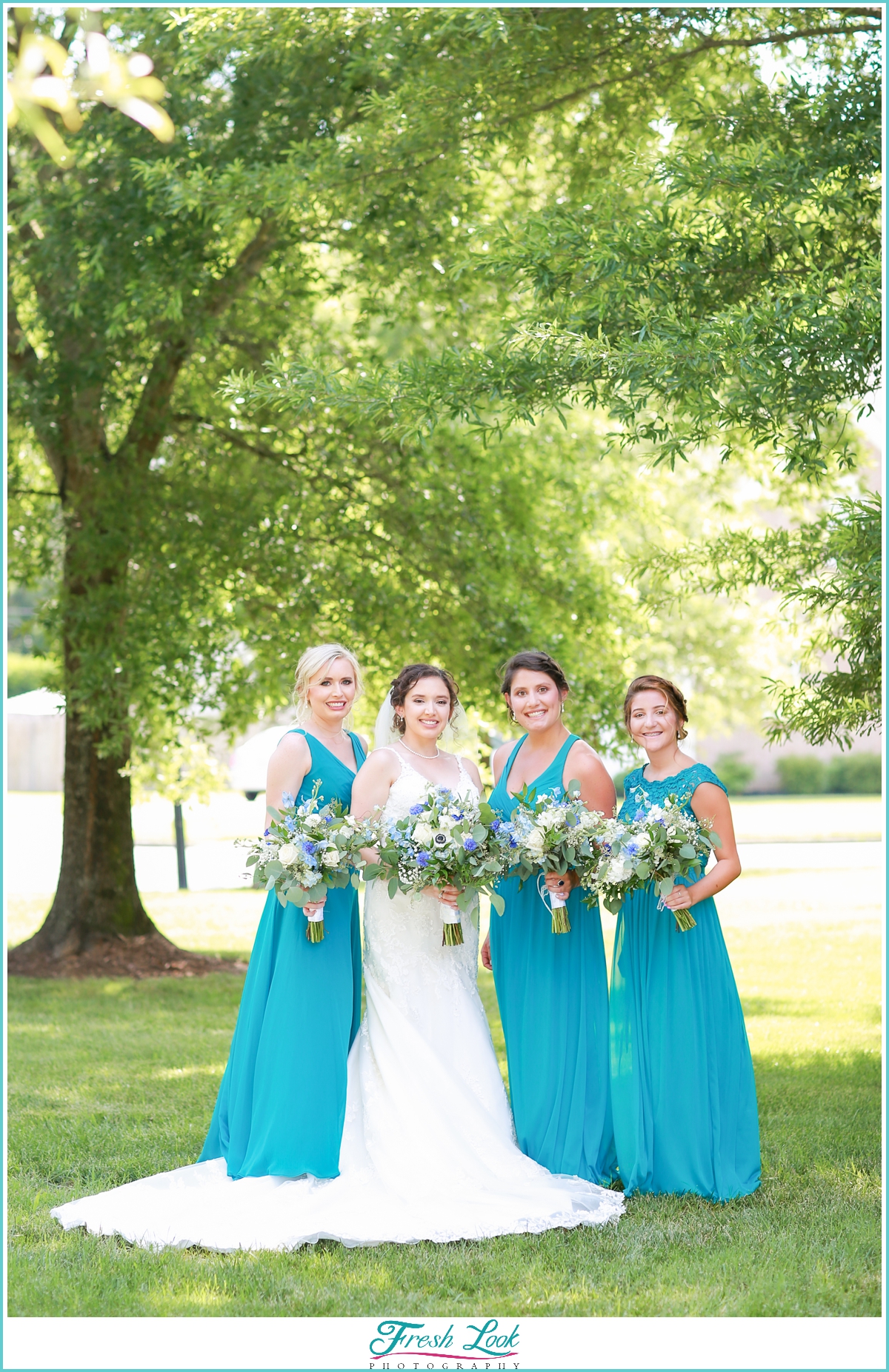 bride and bridesmaids wearing teal