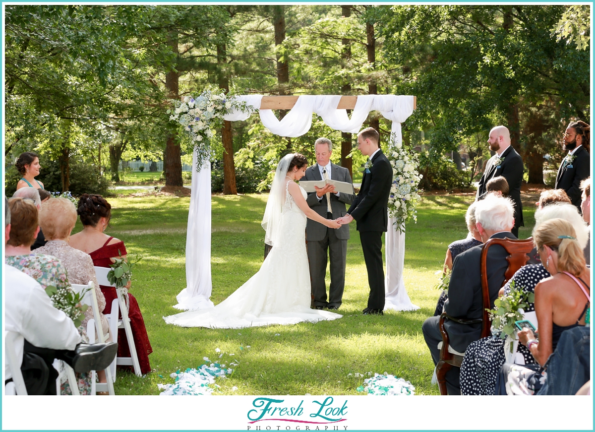 bride and groom at the altar