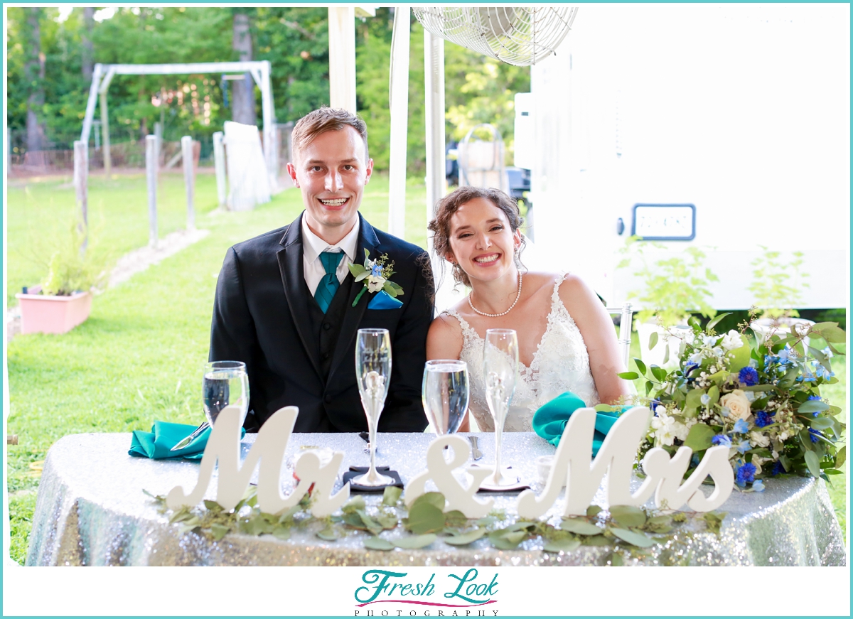 bride and groom at Sweetheart table