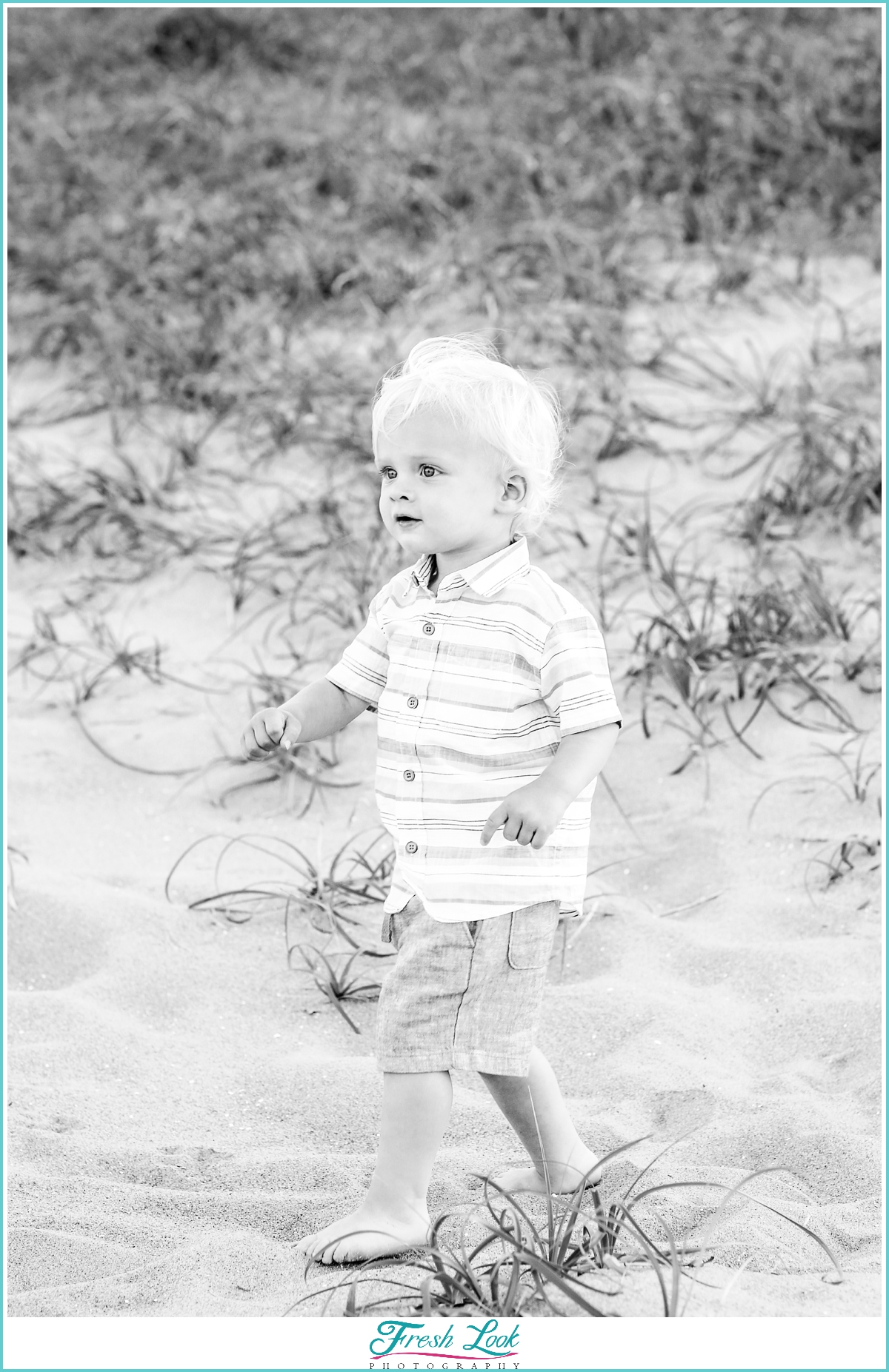 handsome little man on the beach