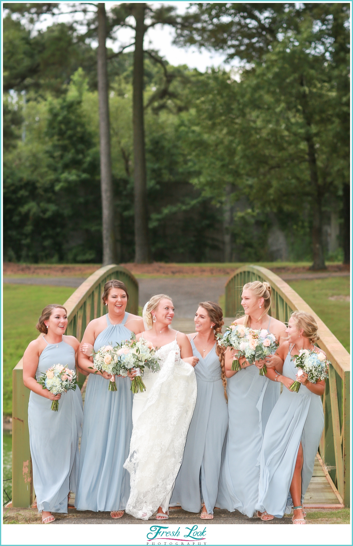 bride and bridesmaids posing ideas