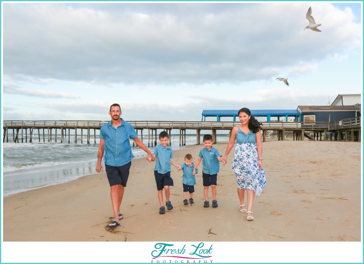 family walking on the beach