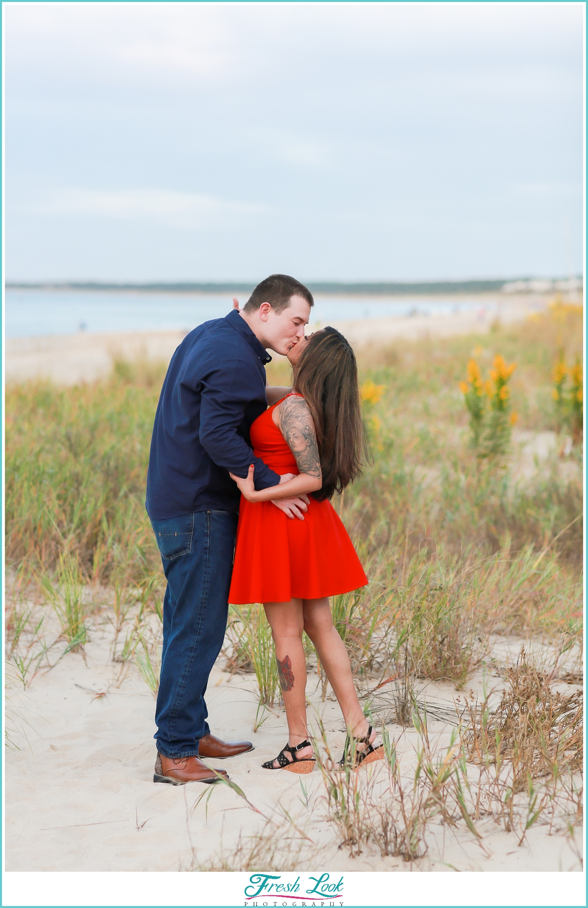 kissing on the beach photoshoot