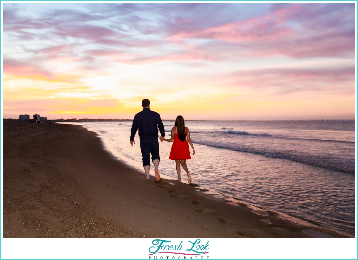 walking hand in hand on the beach