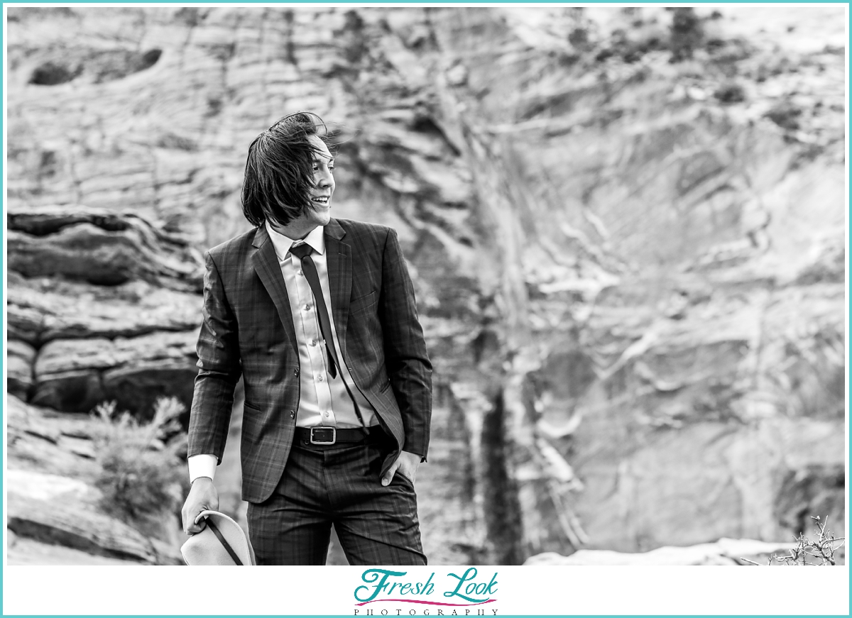 handsome groom black and white portrait