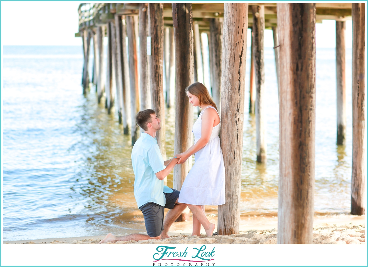 beach proposal on the sand