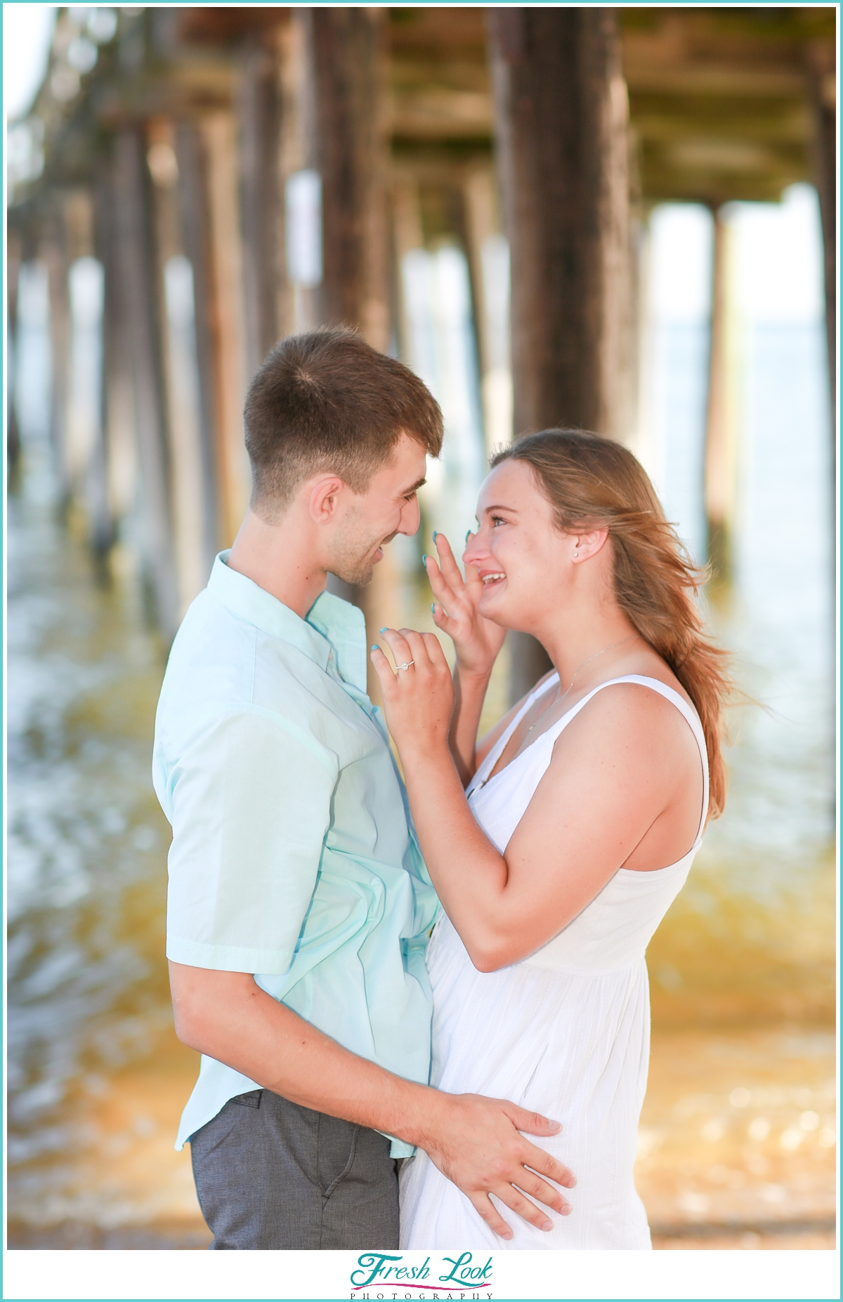 emotional beach proposal photoshoot