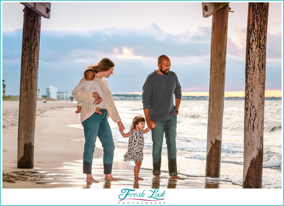 family photoshoot under the pier