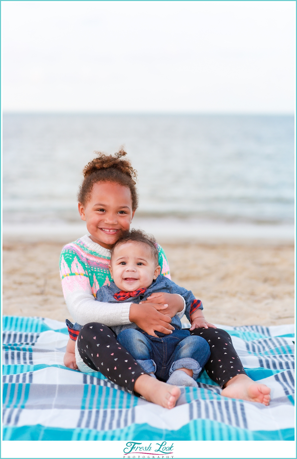 family photoshoot on the beach