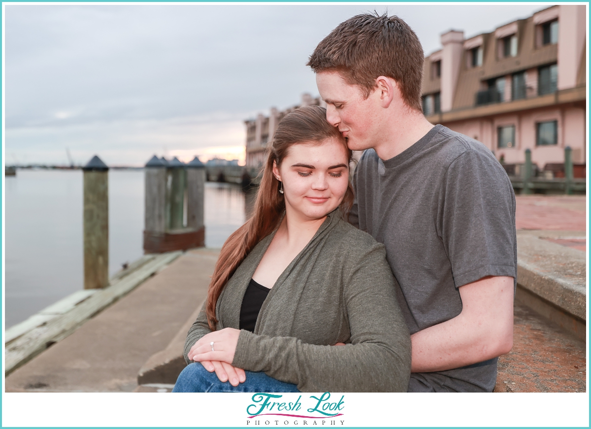 romantic kiss by the water