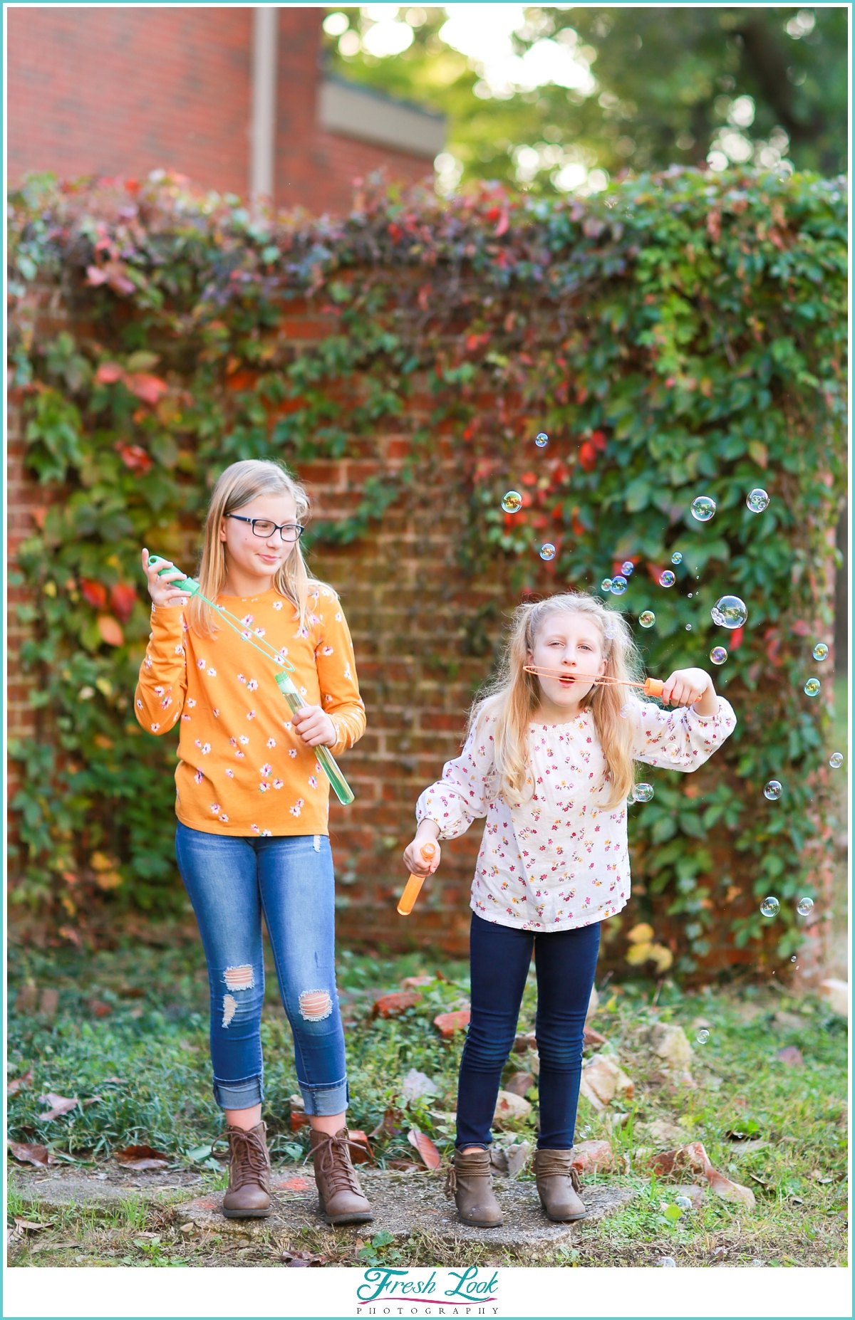 girls blowing bubbles at photoshoot