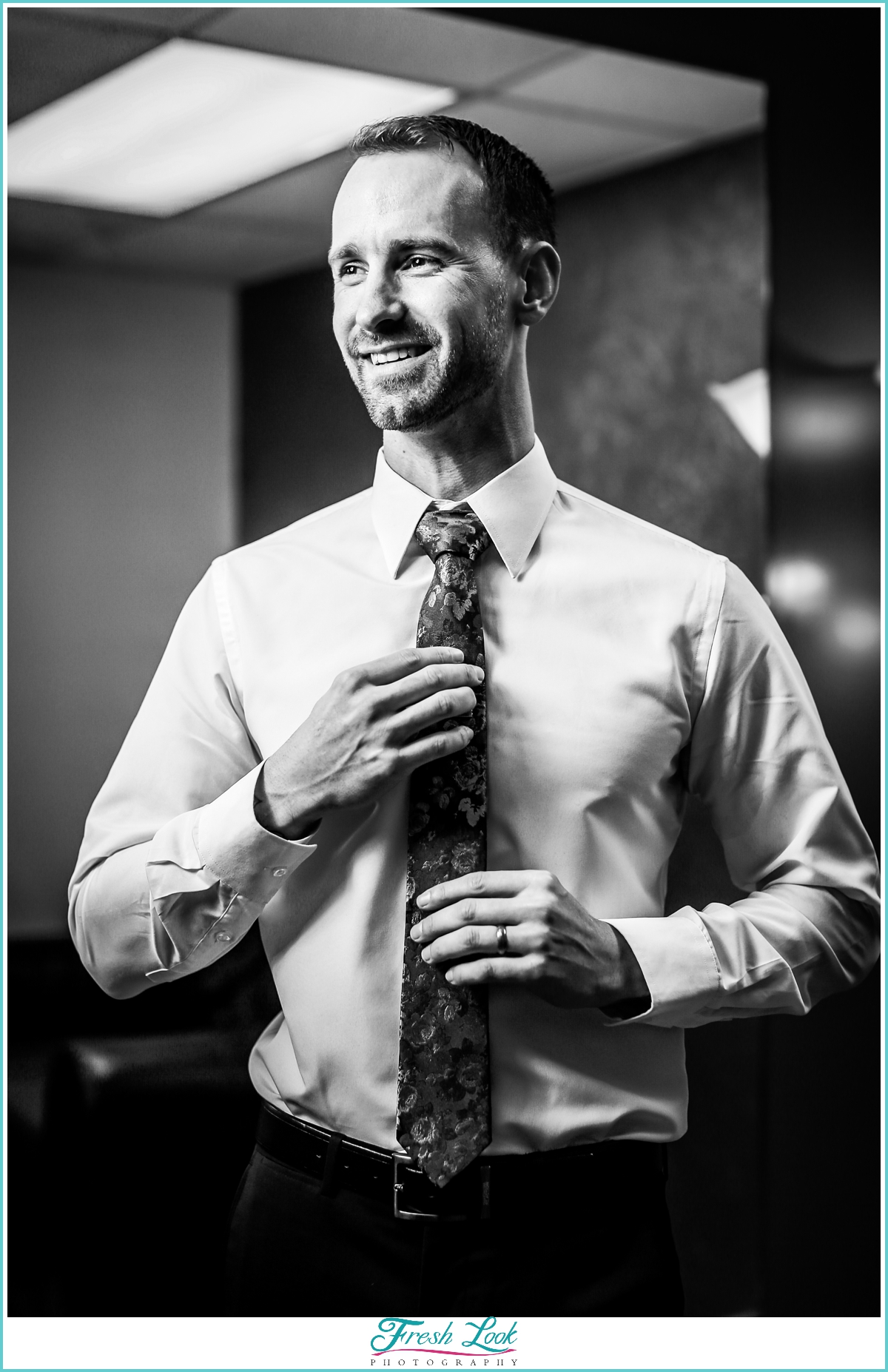 dapper groom black and white photo