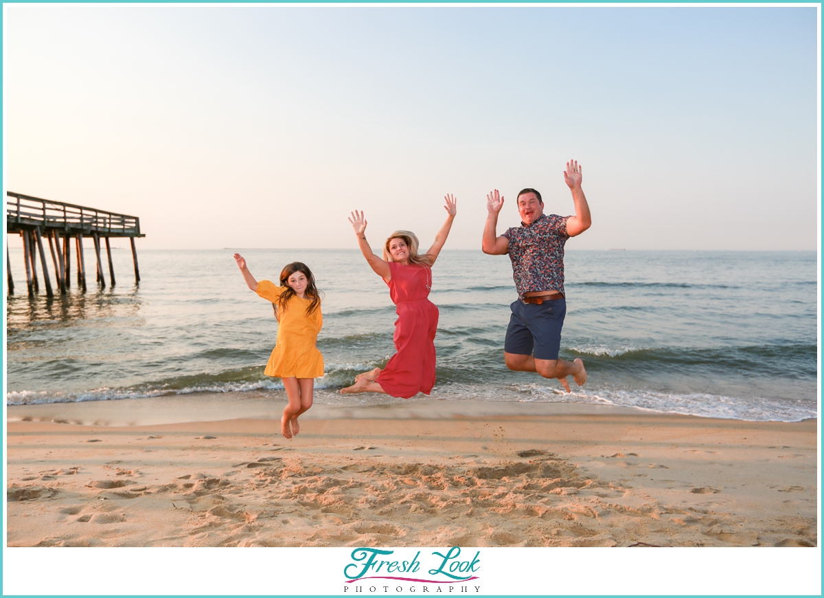 jumping for joy on the beach