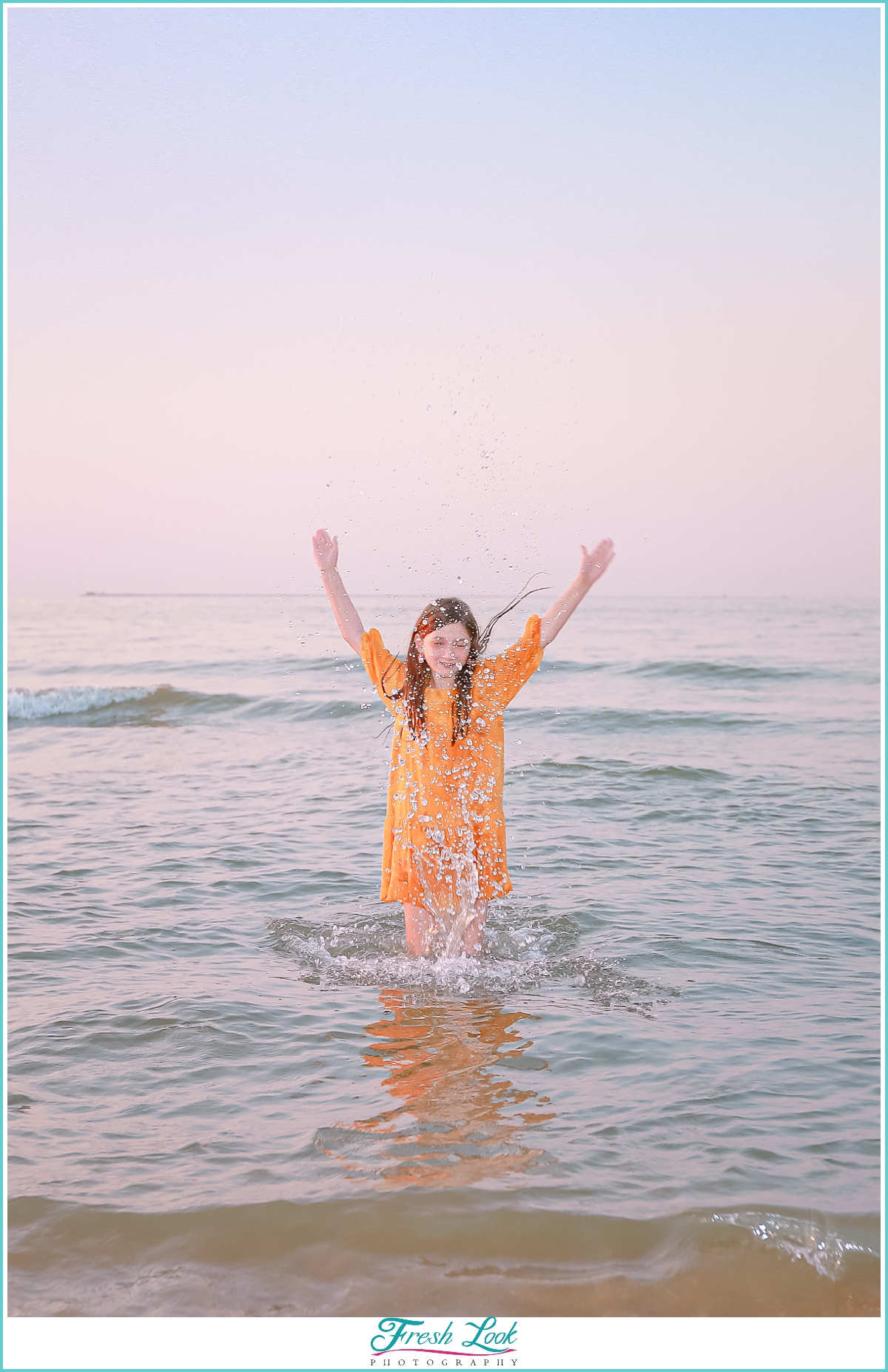 playing in the water at the beach