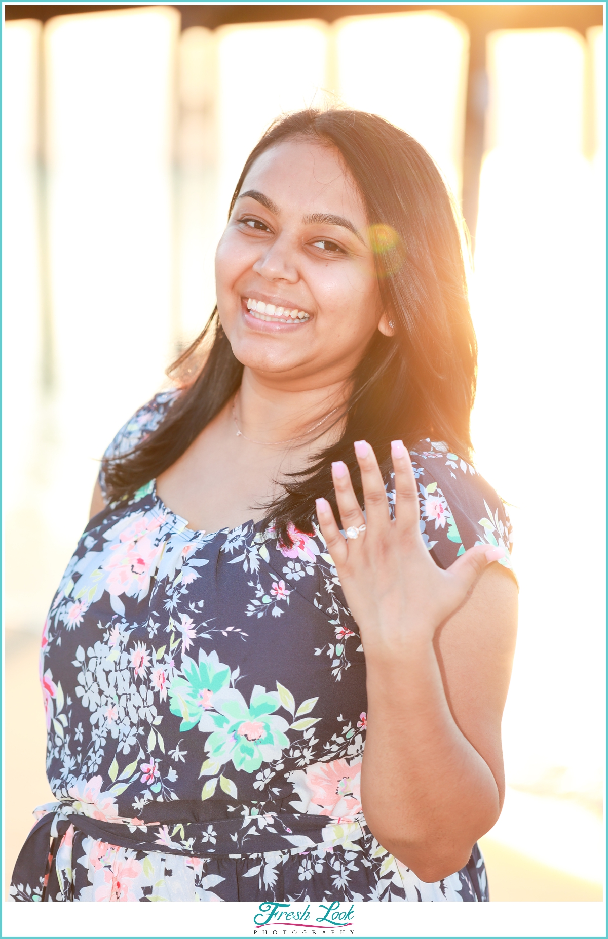 showing off the new engagement ring