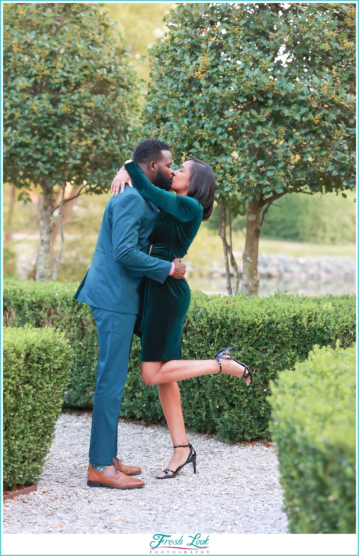 romantic kiss at engagement session