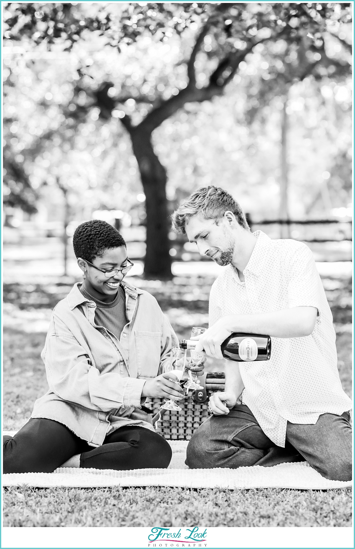 pouring the bubbly at the engagement session