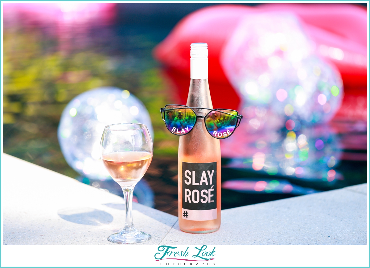 slay rose wine pool party